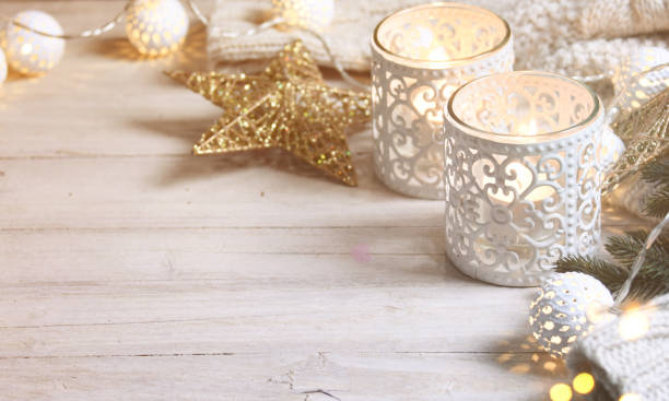 istock Cosy and soft winter background, knitted sweater and lights 1012771232