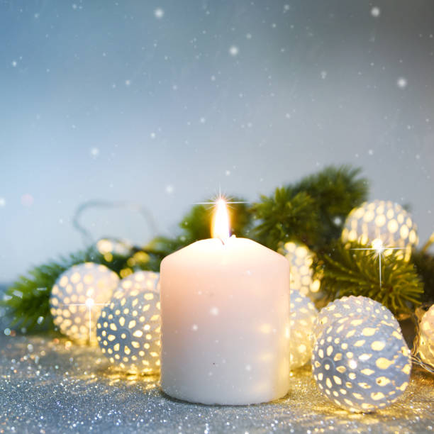 istock Holiday background with christmas candle 1012771408
