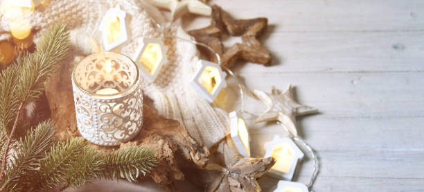 istock Cosy and soft winter background, knitted sweater and lights 1012771522