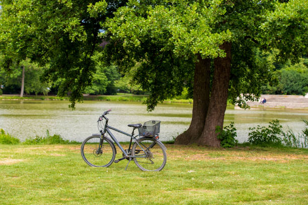 istock Bicycle on the green lawn, Hannover, Lower Saxony, Germany. Copy space for text 1012779082
