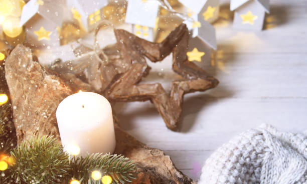 istock Cosy and soft winter background, knitted sweater and lights 1012783676