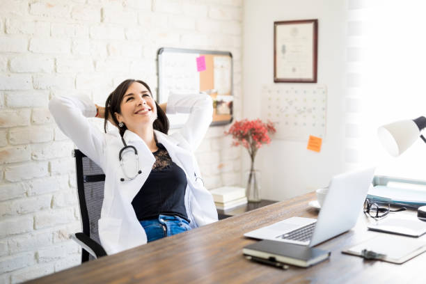 istock Doctor relaxing at her clinic 1012791068
