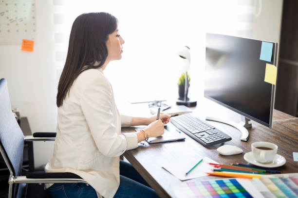 istock Latin female graphic designer 1012793410