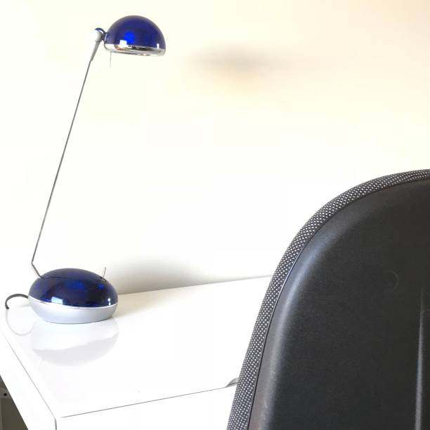 istock White study desk with lamp and chair 1012799158