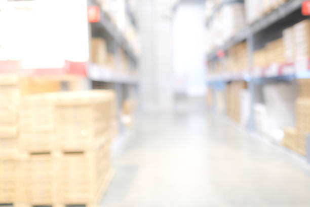 istock Blurred business background, Blur warehouse with bokeh light background 1012818770