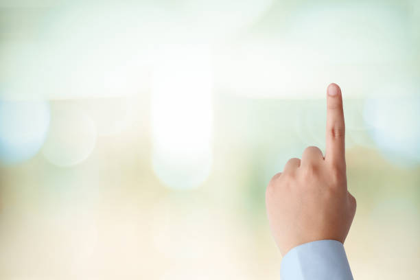 istock Man hand touching over blur office background, business background, banner 1012818804