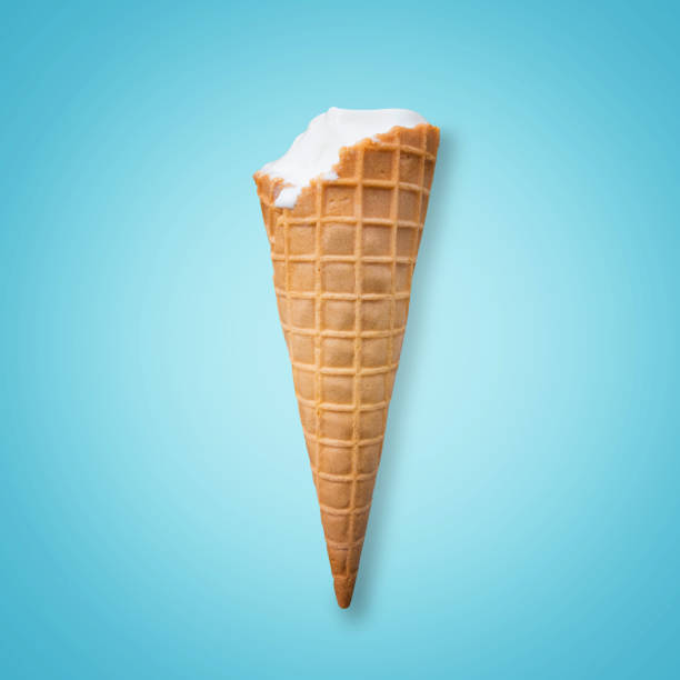 istock Ice cream in the cone on blue background. 1012847830