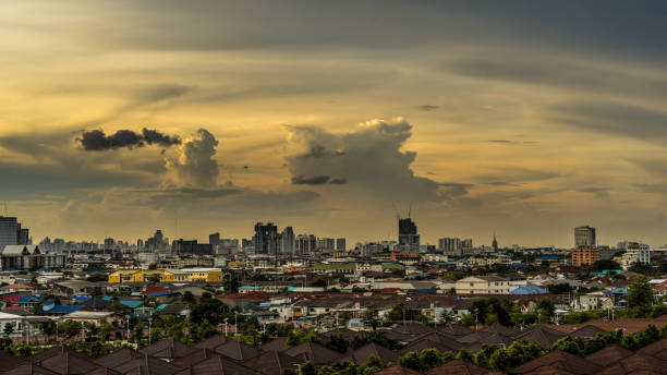 istock urban and cloudy sky in cityscape at evening time 1012847882