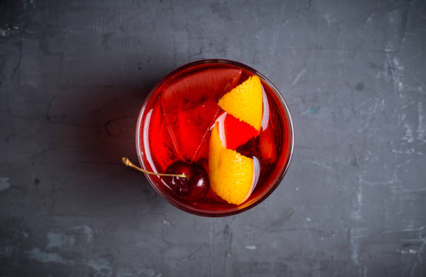 istock Old fashioned cocktail with cherry and orange peel 1012867644