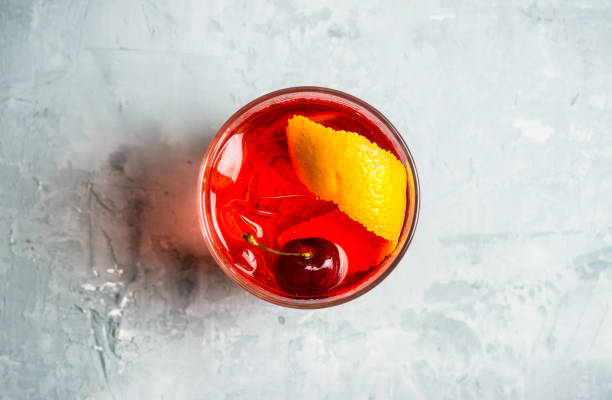 istock Old fashioned cocktail with cherry and orange peel 1012867780