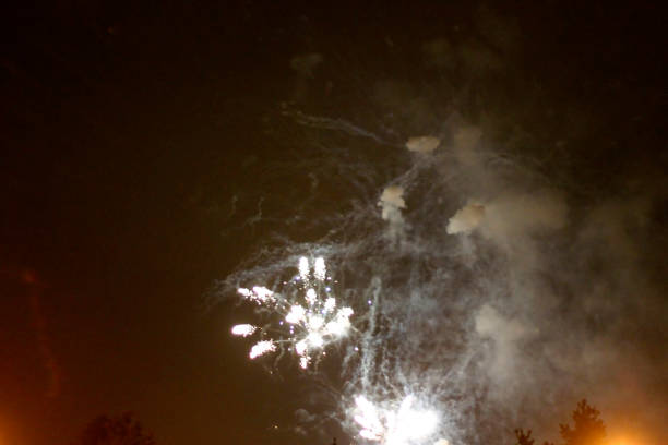 istock Colorful firework in the black night sky 1012892086