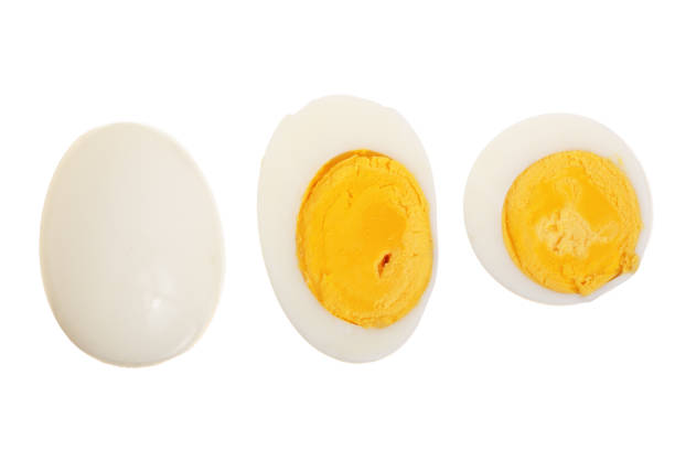 istock boiled egg and half isolated on white background. Top view. Flat lay 1012895026