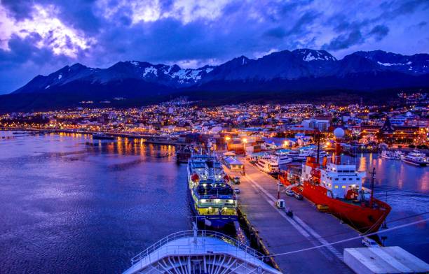 Ushuaia aerial view. the capital of Tierra del Fuego province in Argentina. Panoramic view from cruise ship, harbor and snow mountains background Ushuaia City ushuaia stock pictures, royalty-free photos & images
