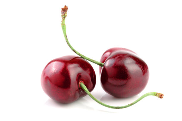 istock Sweet red cherries isolated on white background macro. 1012895178