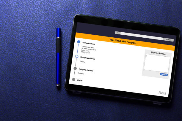 istock online shopping with app on tablet screen with blue pen on blue pattern textured background 1012896074