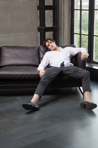 istock Dark haired male model in white shirt 1012913730