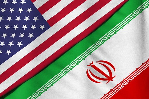 Flag of the Islamic Republic of Iran. Flag of the United States of America.