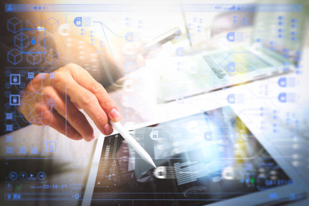 istock Designer hand working with laptop computer on marble desk as responsive web design concept 1012933786
