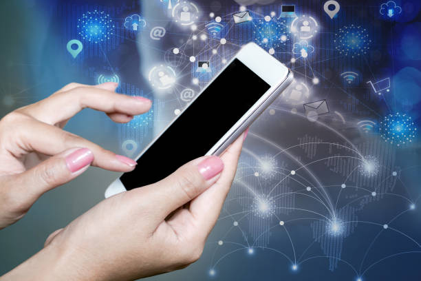 istock woman hand using smart phone with technology global media networking background 1012950912