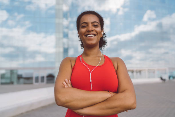 istock Happy sportswoman smiling to the camera 1012959074