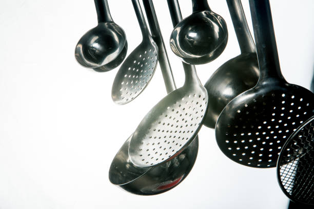 istock metal ladles and saucepans 1012969808