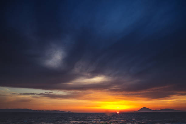 Dramatic sunset over sea in Greece