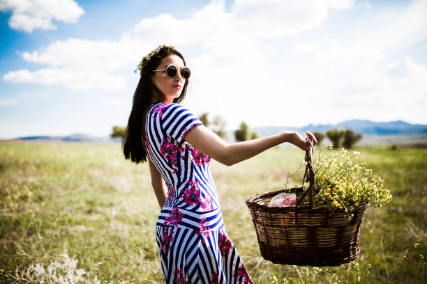 istock a young woman in the spring 1012993794