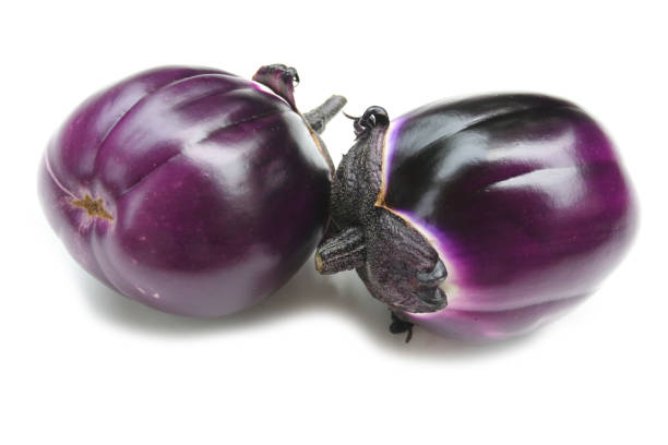 istock Raw round purple eggplants isolated on white 1013009710