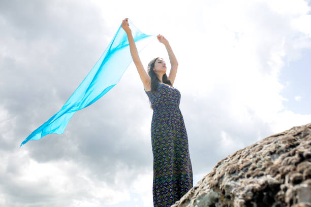 istock a young woman in the spring 1013009736