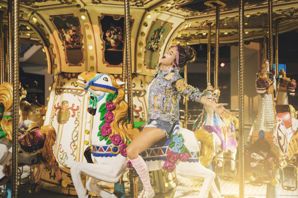 istock Stylish woman wearing sparkling jacket on the carousel 1013013304