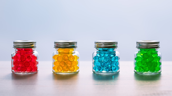 Jars with multi-colored gel balls