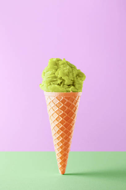 istock Ice cream cone isolated on a colorful background. Copy space. Vivid colors 1013047862
