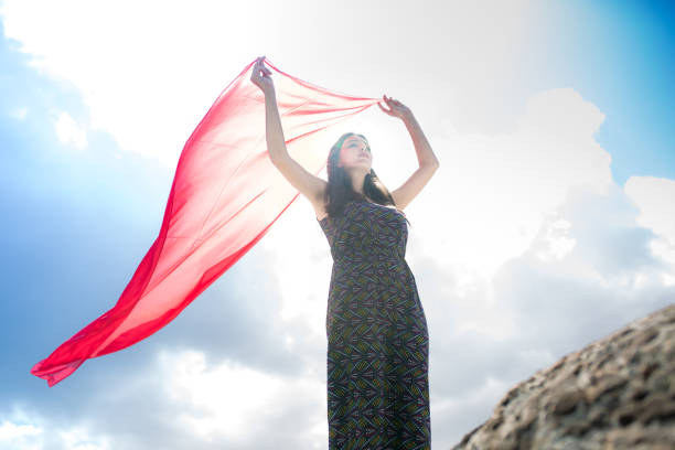 istock a young woman in the spring 1013056164