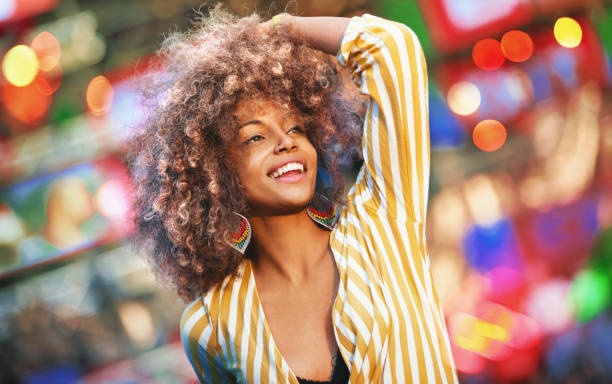istock Black woman dancing at a concert. 1013058838