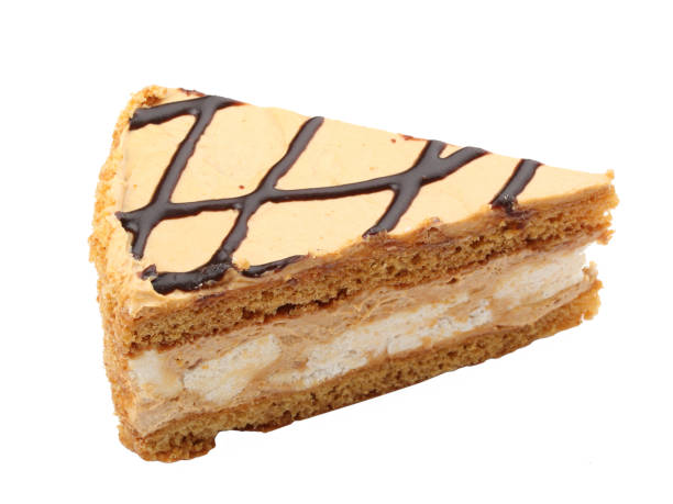 istock Piece of cake with brown cream isolated on a white background 1013073090