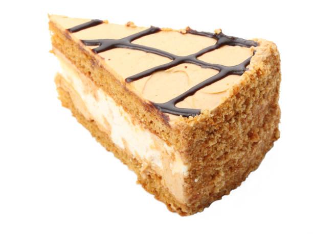 istock Piece of cake with brown cream isolated on a white background 1013073248