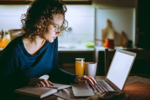 istock Woman working on laptop at home 1013076978