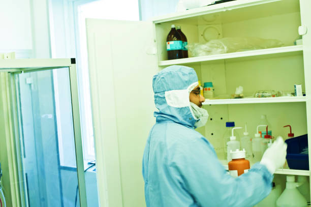 Asian Research Scientist / Chemist At Work In The Laboratory