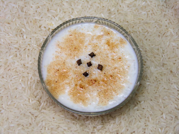 Typical Brazilian dessert sweet milk rice or rice pudding also know in portuguese as 'arroz doce or arroz de leite'. Creamy rice pudding sprinkled with cinnamon and clove.
