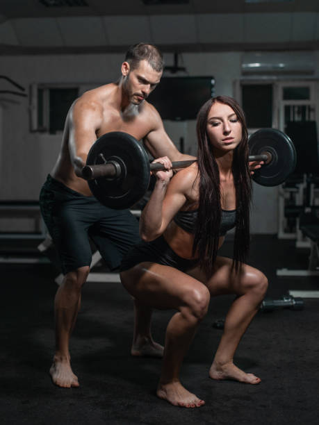 istock group with dumbbell weight training equipment on sport gym. 1013097074