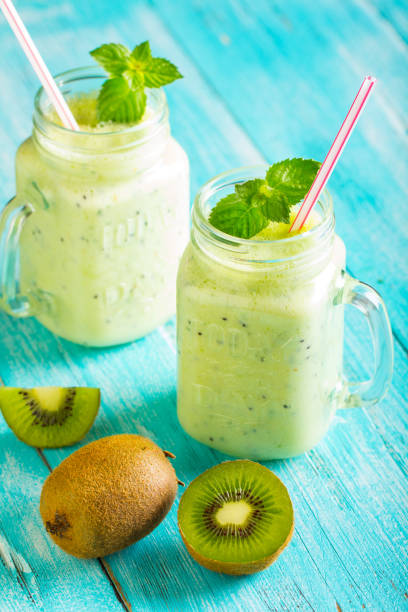 istock kiwi smoothies fresh vitamin cocktail wooden background 1013100480