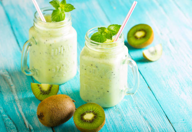 istock kiwi smoothies fresh vitamin cocktail wooden background 1013106472