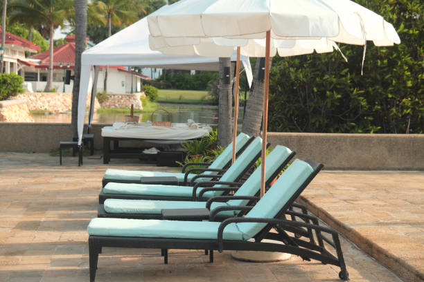 istock Row of pool chairs 1013118340