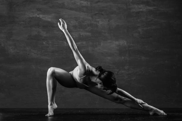 istock Gymnasts woman posing in studio 1013121384