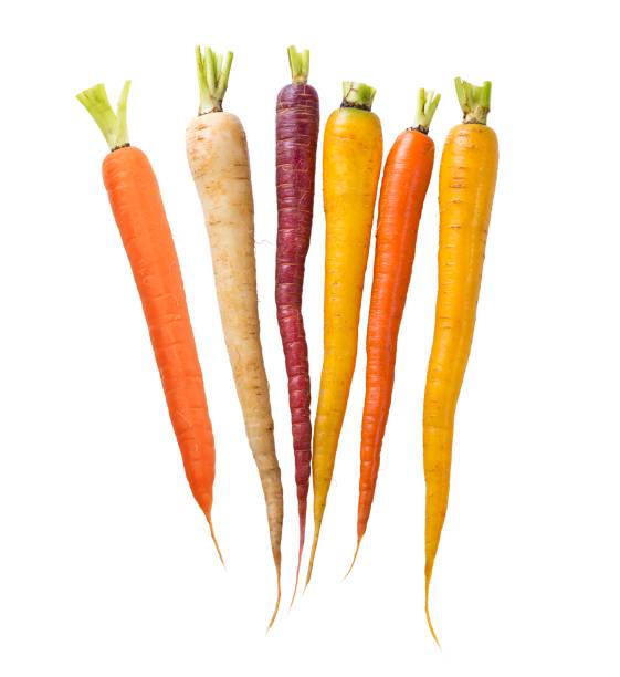 Colorful Rainbow carrots on white background stock photo