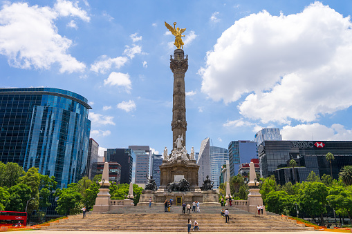 The Angel of Independence, officially known as Monumento a la Independencia is a victory column on a roundabout on the major thoroughfare of Paseo de la Reforma in downtown Mexico City.