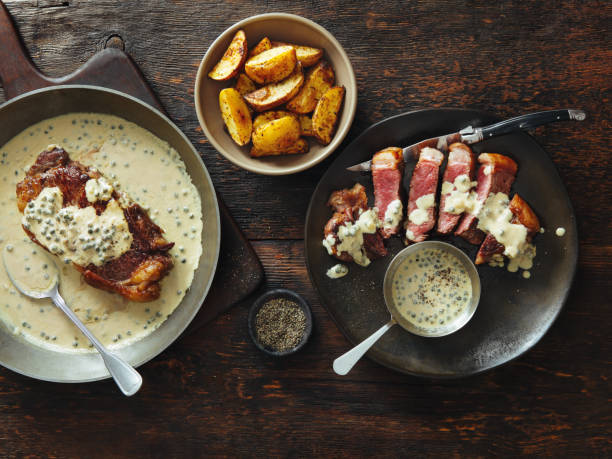 istock Steak with mustard and green peppercorns sauce 1013169456