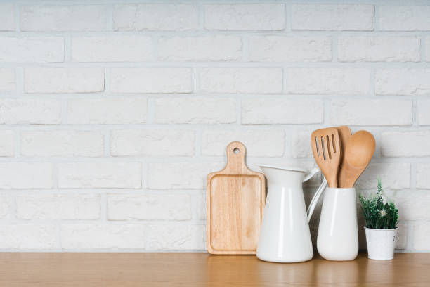 istock There are various cookers on the table, background made of bricks painted white color only. 1013182730