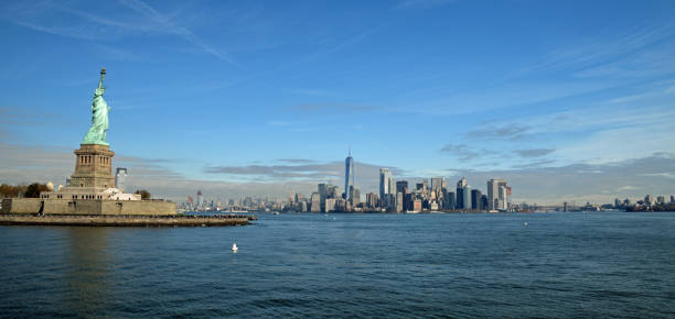 istock Statue of Liberty and NYC skyline 1013185684