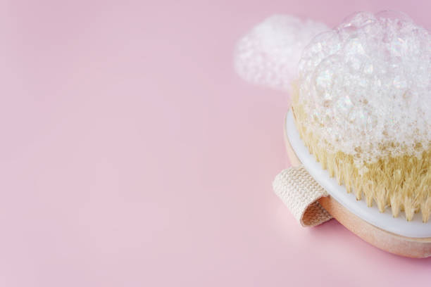 istock skin care theme. brush with foam bubbles 1013191204